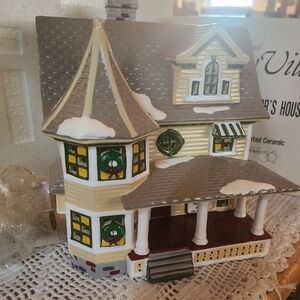Charming Holiday Ceramic House with Wreaths